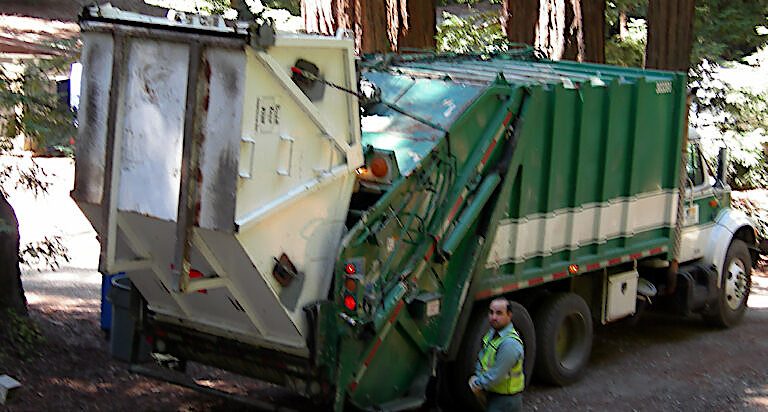 Emptying a Rear-Dumping Refuse Container